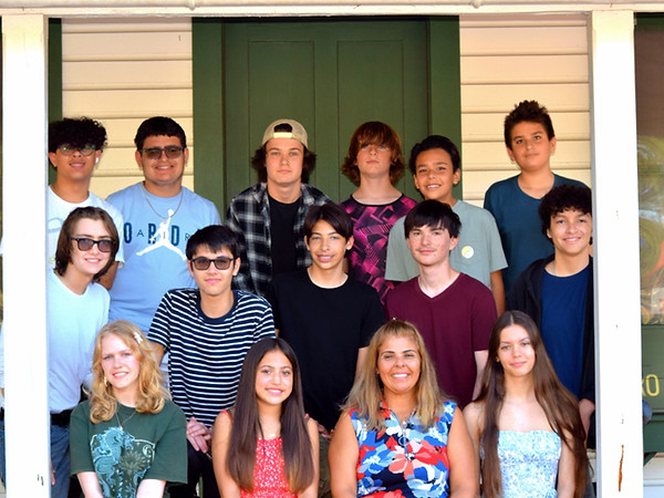 Middle and high school students at 3 Oaks Academy in a collaborative learning environment